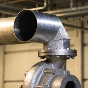 eccentric reducer installed flat side up on pump suction inlet to prevent air pockets